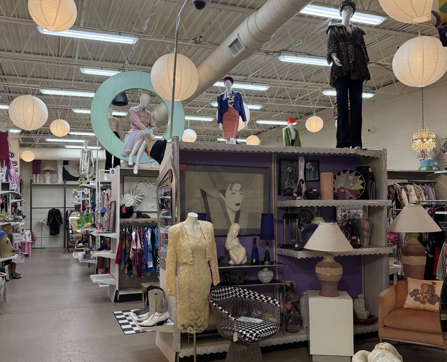 Vintage clothing and decor store interior display.